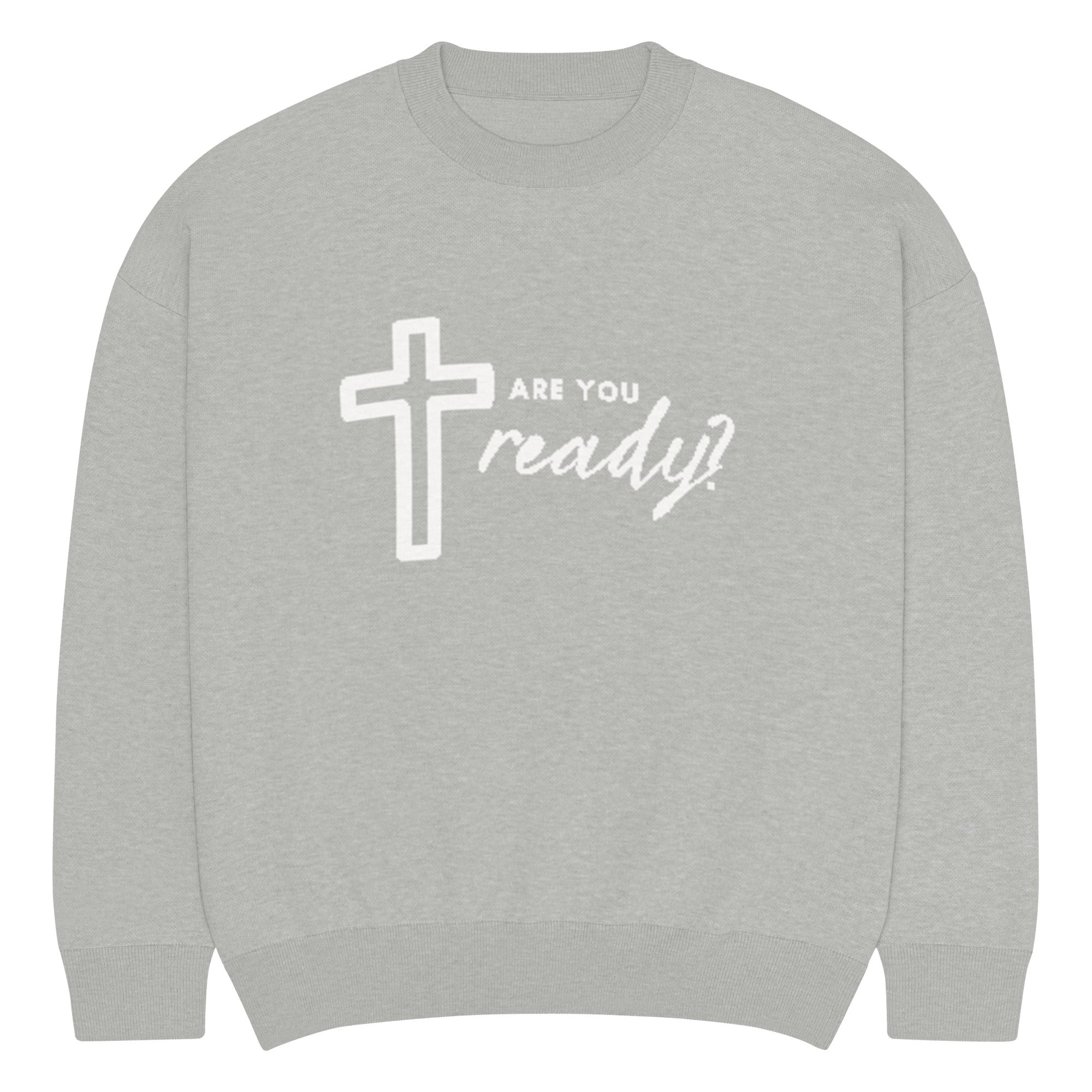 Front of Gray knitted sweatshirt with a white cross and text 