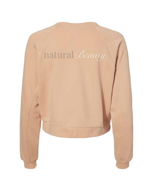 Back of Sandy Beige sweatshirt with 'natural beauty' text in tan and white colors
