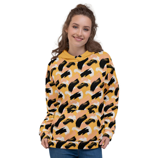 Front of Woman wearing a yellow hoodie with black abstract pattern