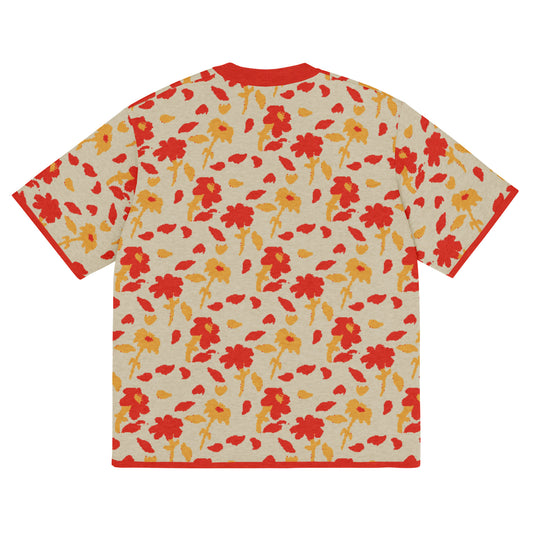 Back of beige knitted tee with a red and yellow Floral pattern
