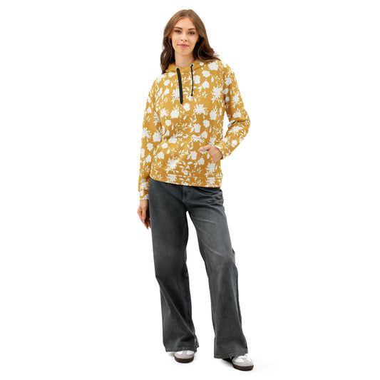Front of Woman wearing a yellow floral long-sleeve hoodie and gray black pants 