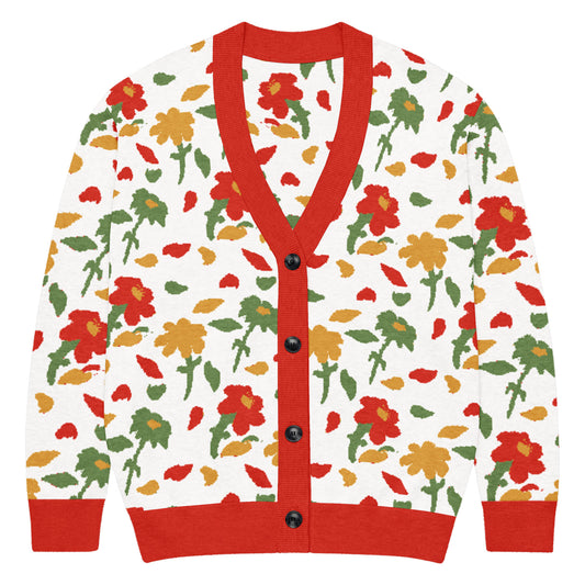 Front of Cardigan with red, green, yellow floral pattern and red trim with buttons