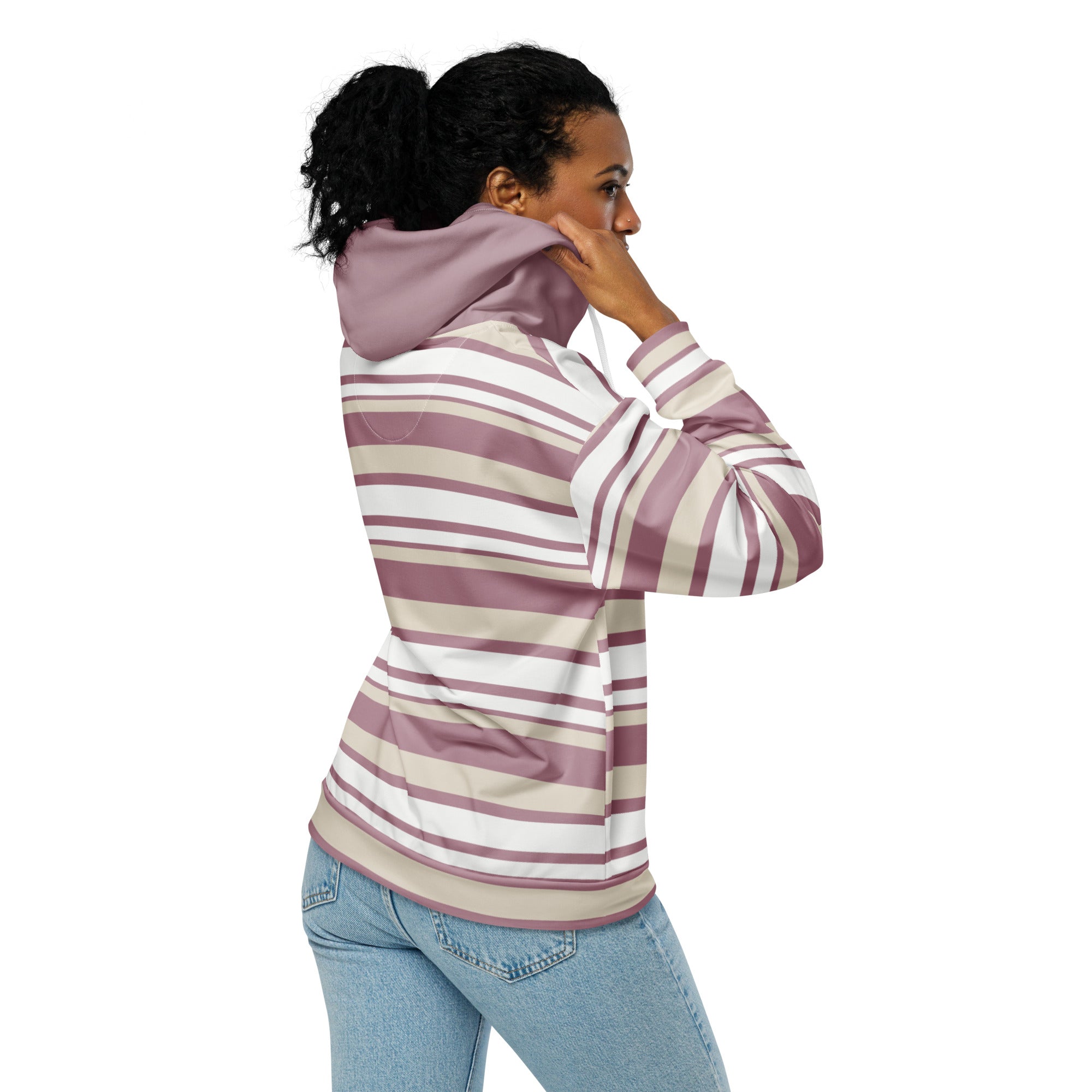 Back right of a Woman wearing a striped hoodie and jeans 