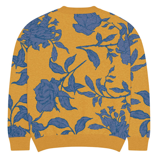 Back of Knitted Yellow sweater with blue floral pattern