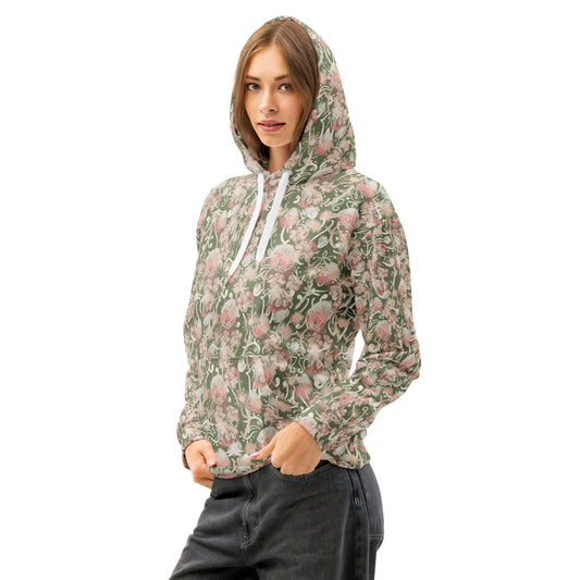 Front left of woman wearing a olive green base hoodie with pink and white floral-pattern and pocket