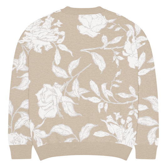 Back of Knitted Tan Sand Colored sweater with white floral pattern 