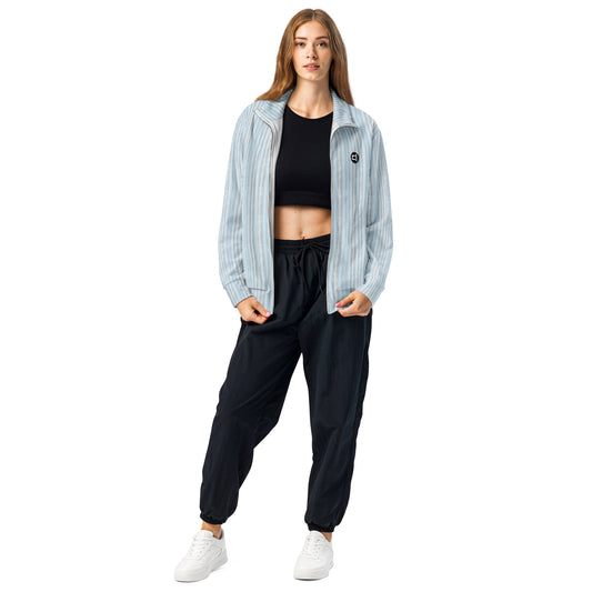 Air Striped Eco Track Jacket Outerwear by Carl & Lyn front unzipped with person wearing it over crop top and sweats with shoes and right leg slightly bent