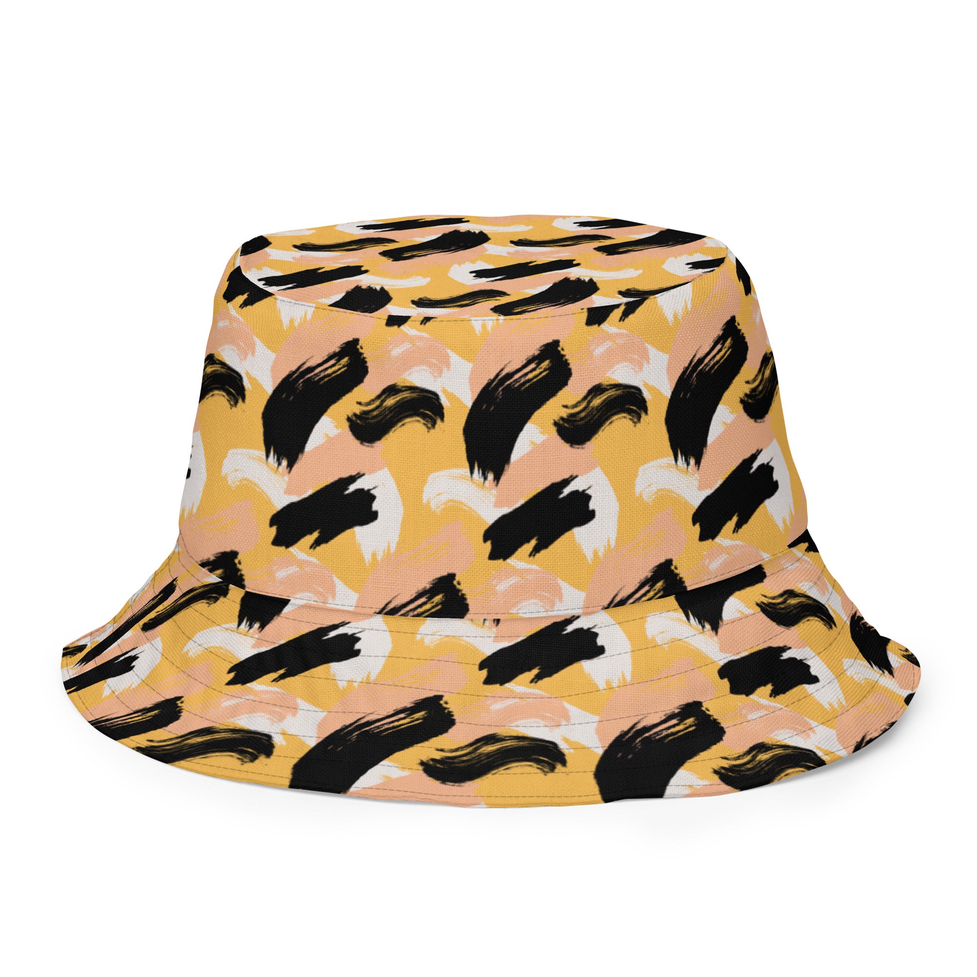 Back of Bucket hat with black abstract pattern of paint strokes that resemble cheetah color combination 