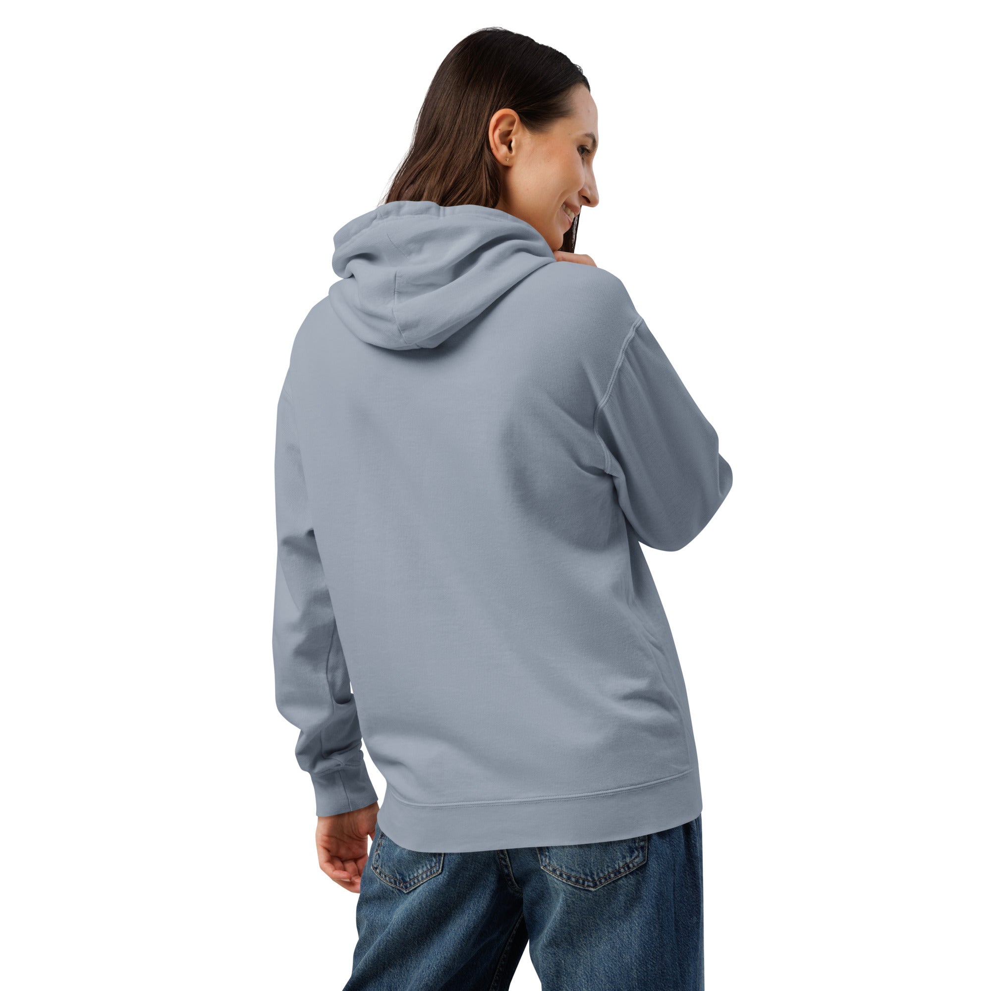 Back of woman wearing a denim blue hoodie leaning right and looking right smiling