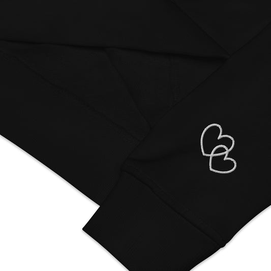 Embrace differences - Eco Sweatshirt Sweatshirt by Carl & Lyn black left cuff with embroidery hearts