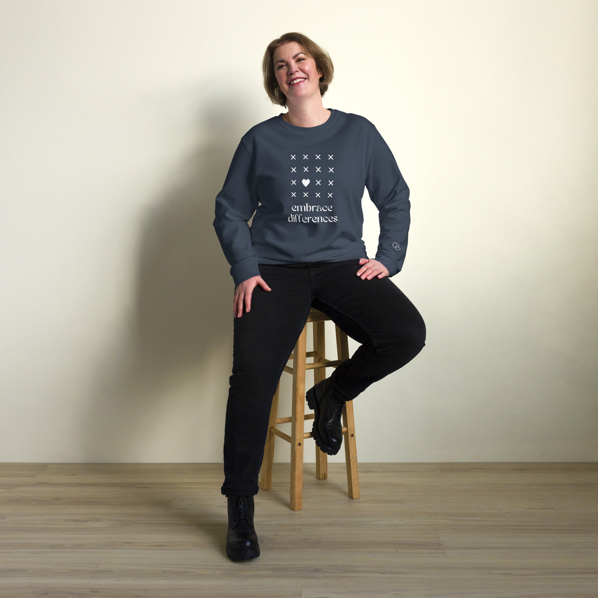 Embrace differences - Eco Sweatshirt Sweatshirt by Carl & Lyn french navy front person sitting