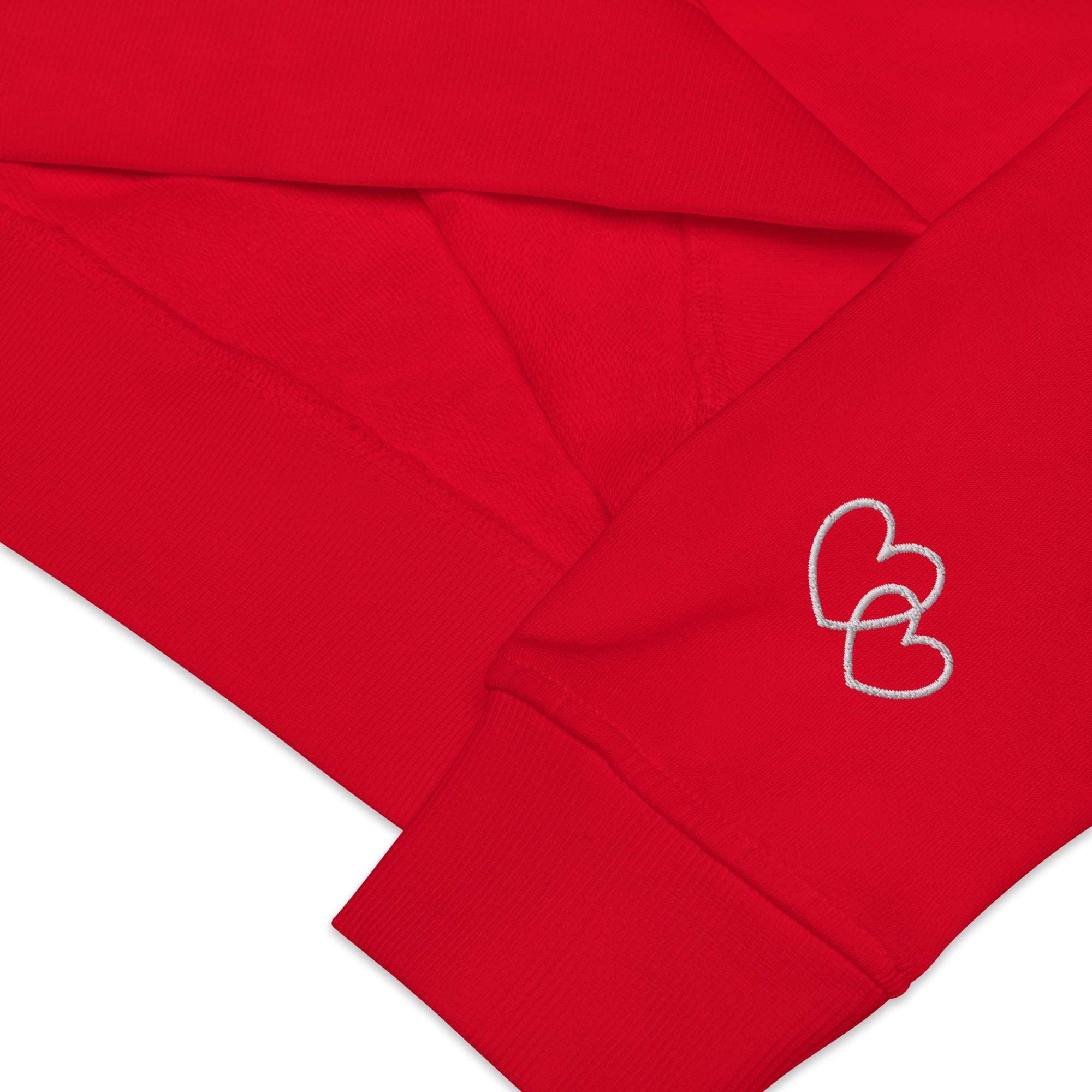 Embrace differences - Eco Sweatshirt Sweatshirt by Carl & Lyn red left cuff with embroidery hearts